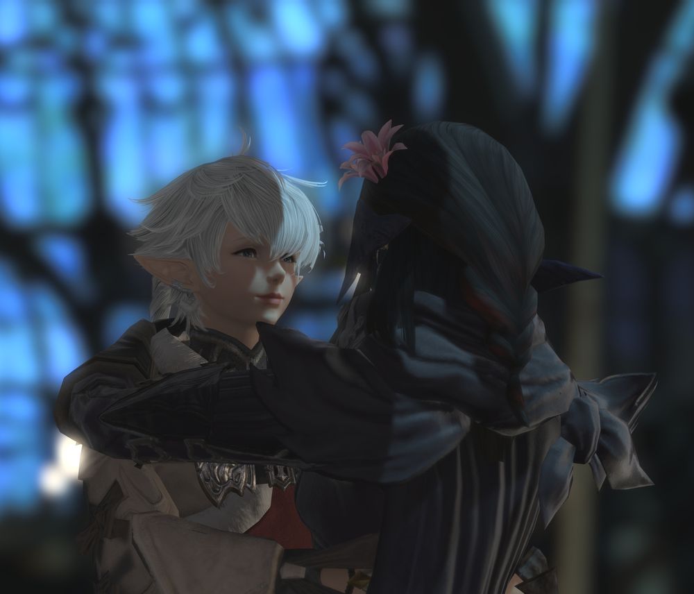 A close up shot of Alisaie smiling as she and Sari dance together.