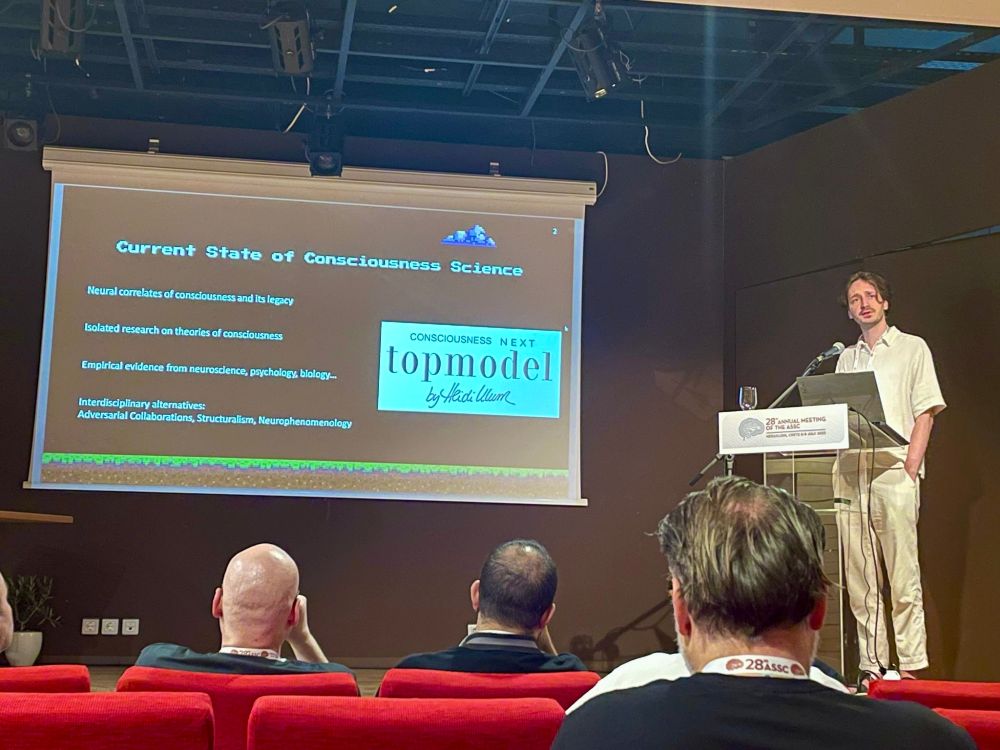 moritz kriegleder presenting a slide on the current state of consciousness science