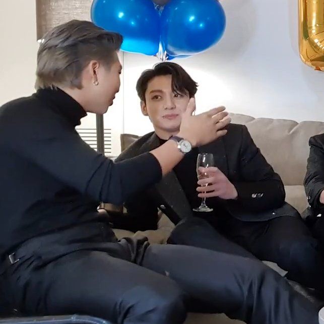 Namjoon and Jungkook during a livestream after their Butter performance on the Grammy's; they're still in their all black outfits. Namjoon is turned away from the camera, talking animatedly to Jungkook, who's staring at him in admiration (worshipfulness, dare I say?).