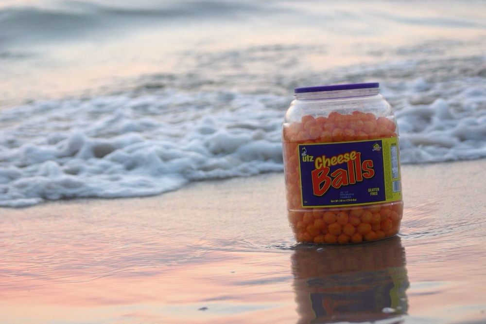 cheeseballs on the beach its cheeseballs and theyre on thje beach great value
