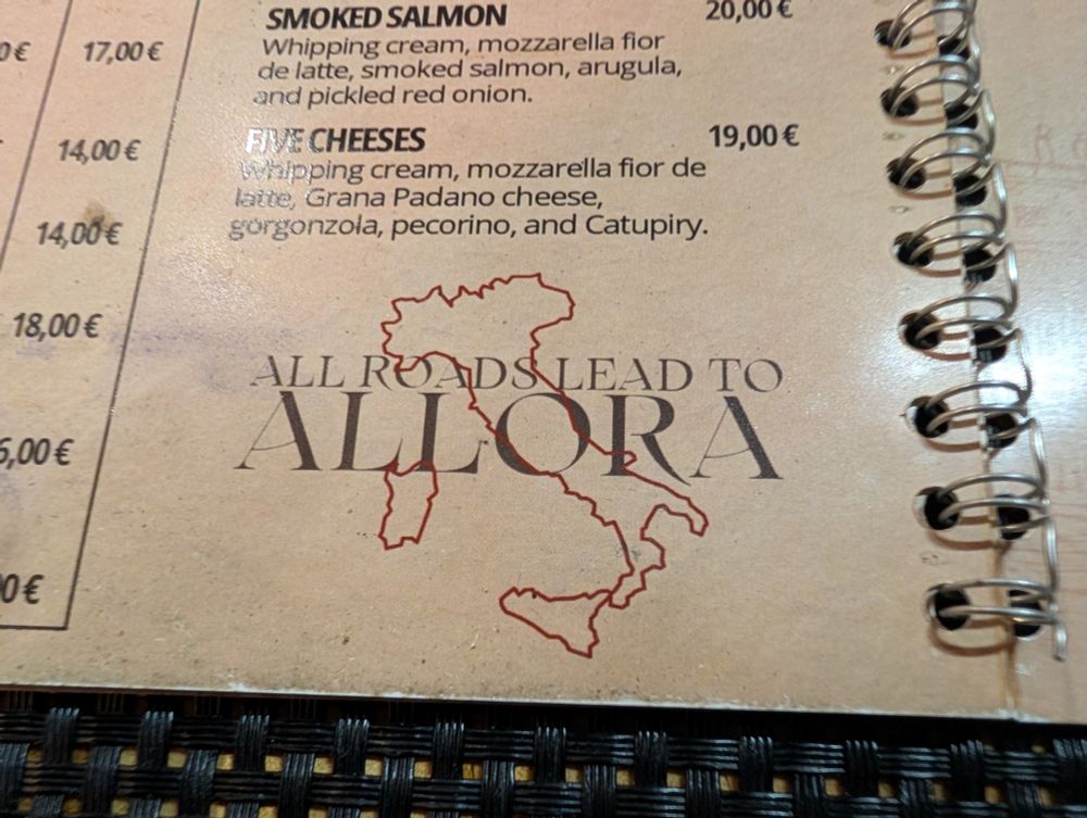A graphic from a menu with the outline of Italy and, in a serif font, the words "All roads lead to Allora". 