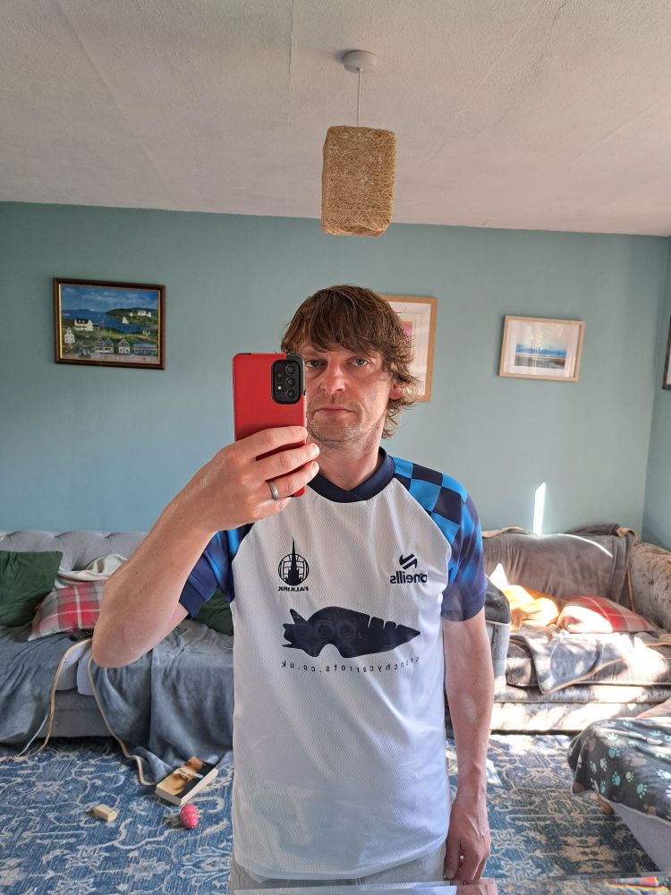 Mirror selfie. Im wearing a white and blue Falkirk FC shirt 