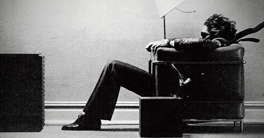 Famous Maxell Cassette advertisement from the 1980s showing a man in a chair in front of a speaker, with his hair and clothing being blown backwards by the music coming from the speaker in front of him.