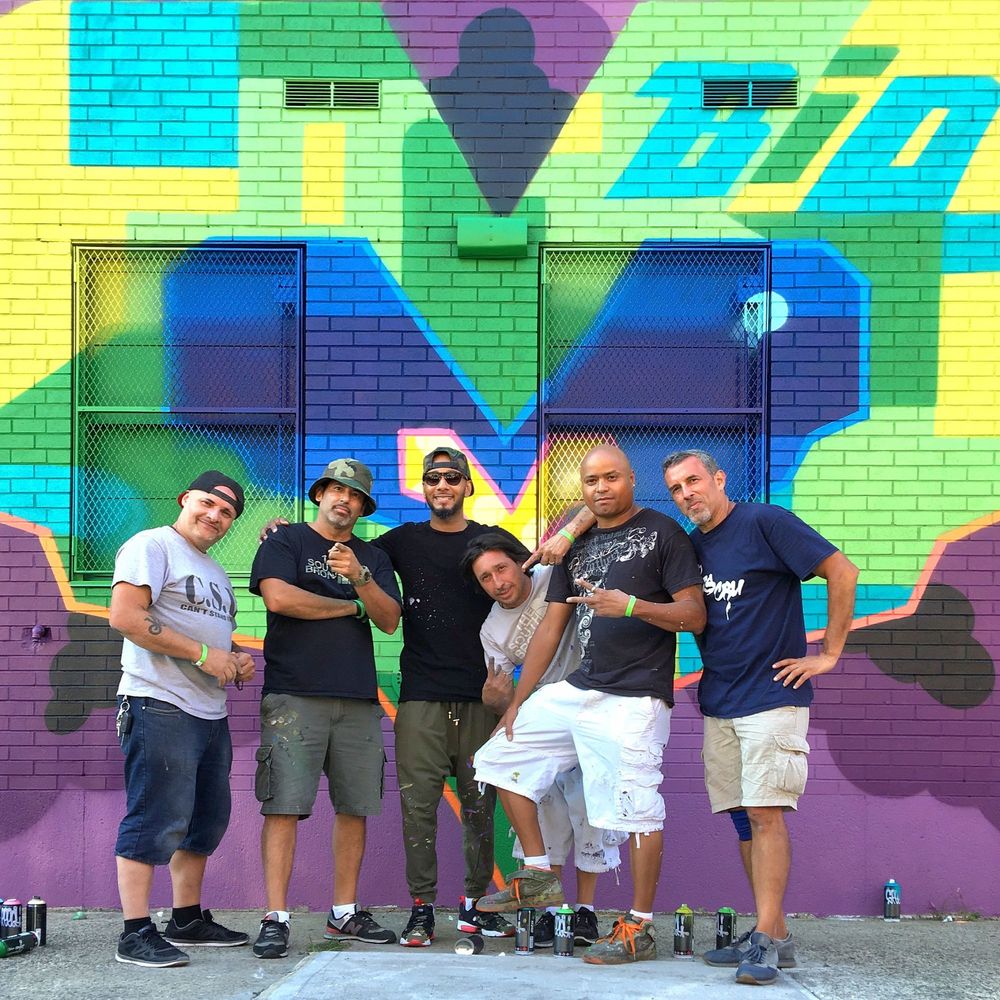Record producer Swizz Beatz poses with artists Sexer, Bio, Nicer, BG183, Crash in front of their production for No Commission in The Bronx, New York.