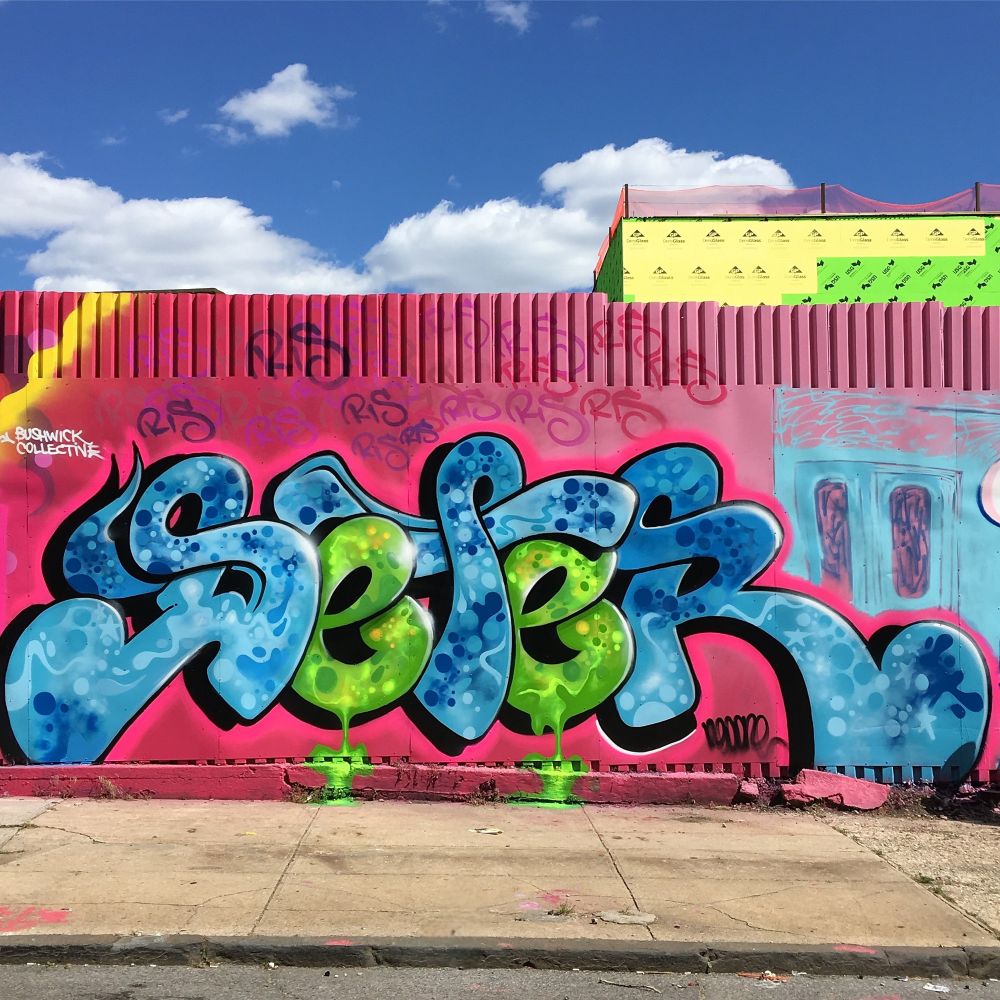 Piece by Det for the Bushwick Collective in Bushwick in Brooklyn, New York. 