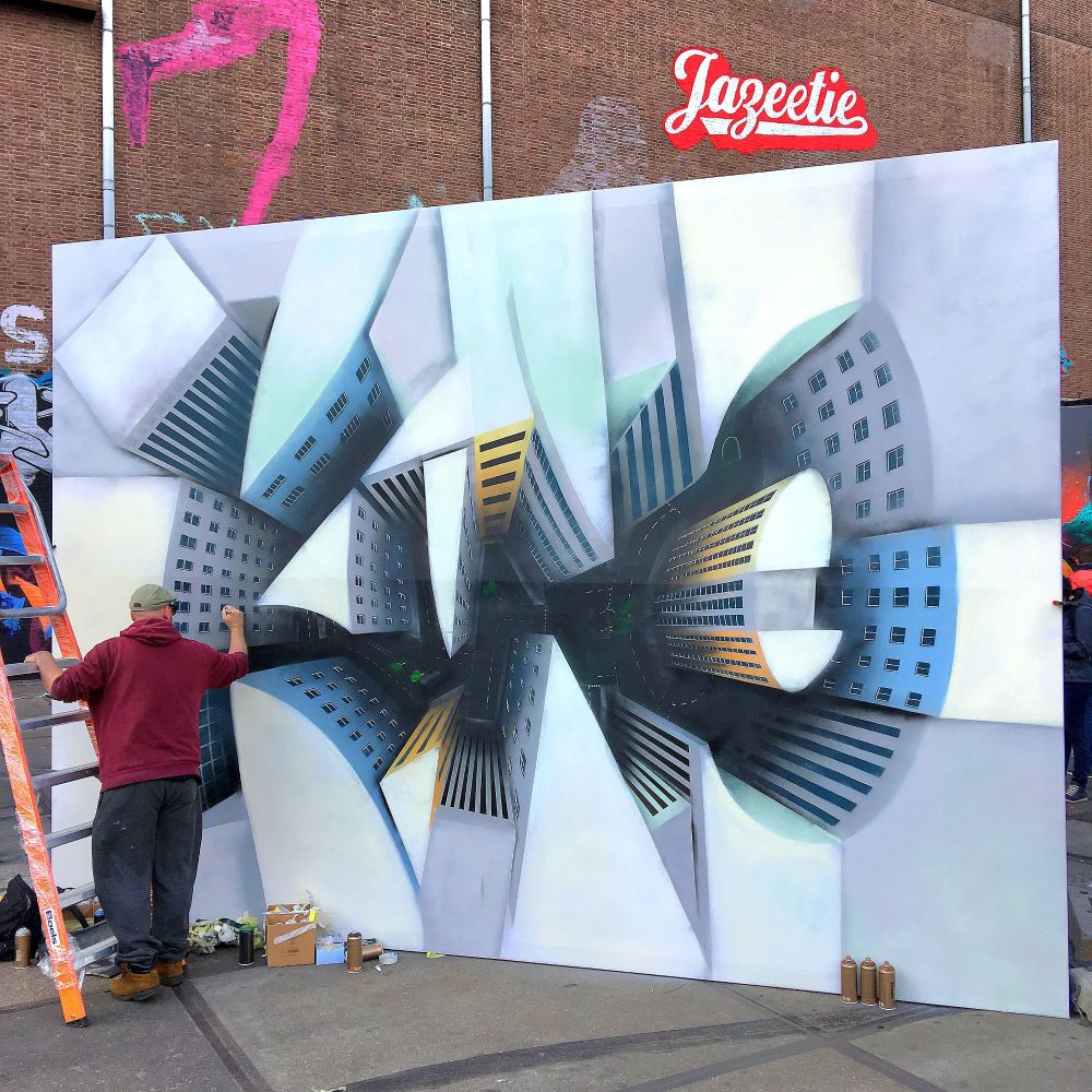 Artist Zeus paints a canvas for Kings Spray curated by StreetArtToday at the NDSM in Amsterdam, The Netherlands. 