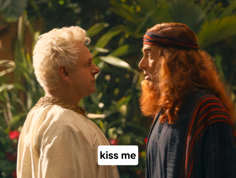 Aziraphale and Crowley facing each other and looking each other in the eye...they both look hot as usual.