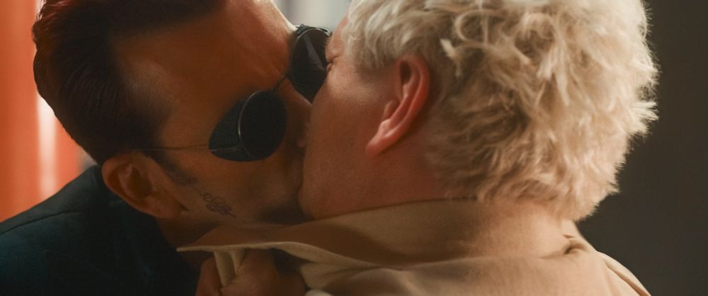 Crowley kissing Aziraphale.
