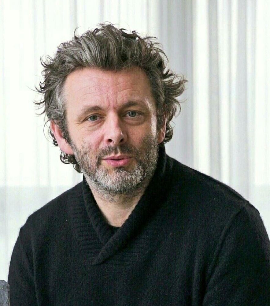 Michael Sheen wearing a dark woolly jumper and blowing me a kiss...I think..