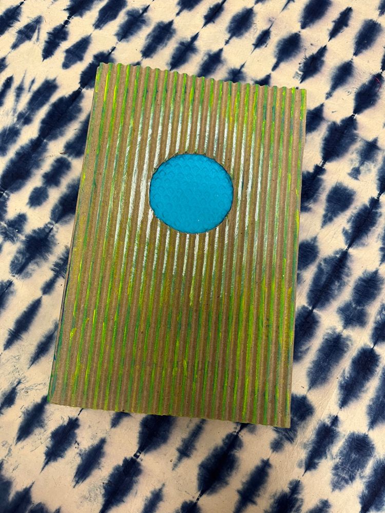 Another photograph of the fronnt of the book.