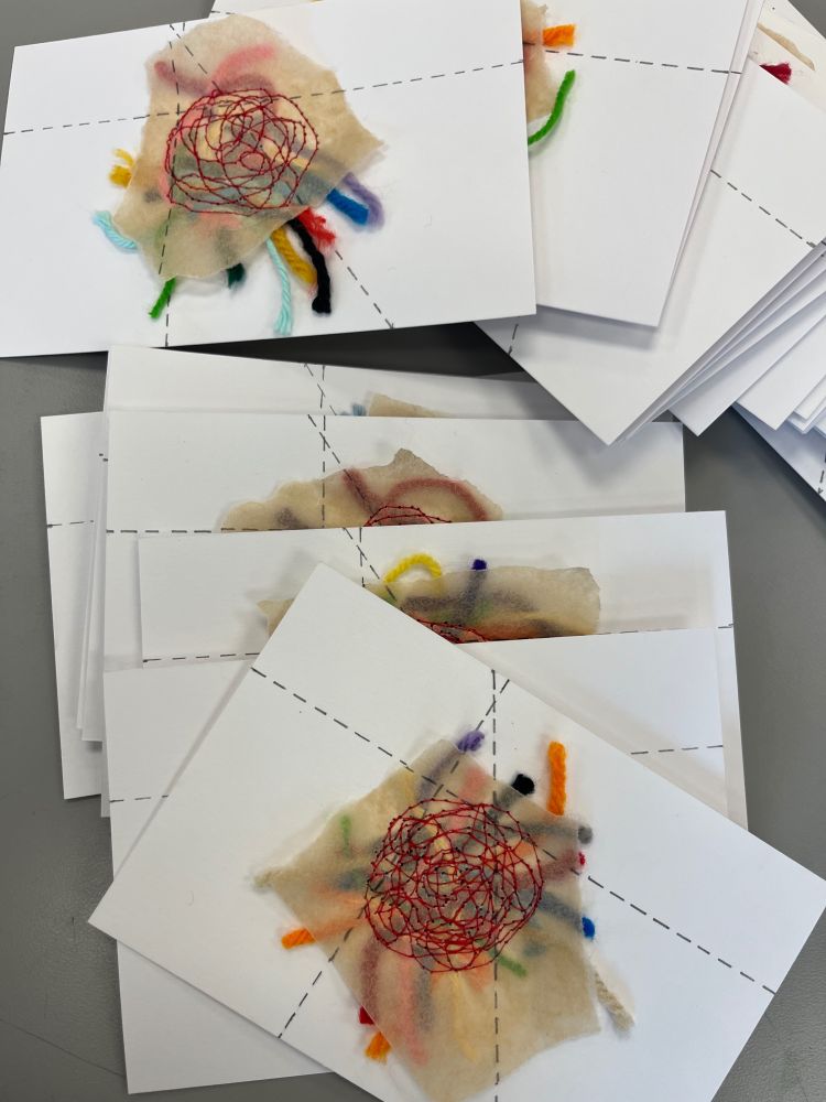 Another photograph of the postcards.