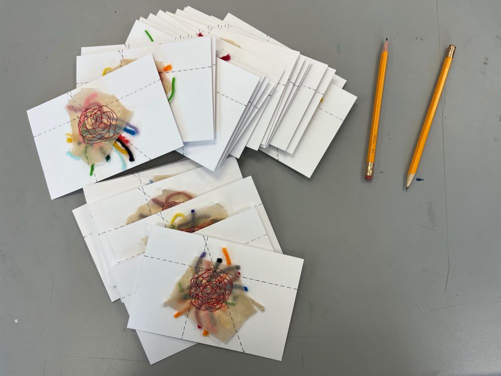 Photograph of the thirty-two postcards.