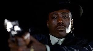 man aiming gun while crying