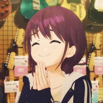 a girl is smiling in front of a wall of guitars