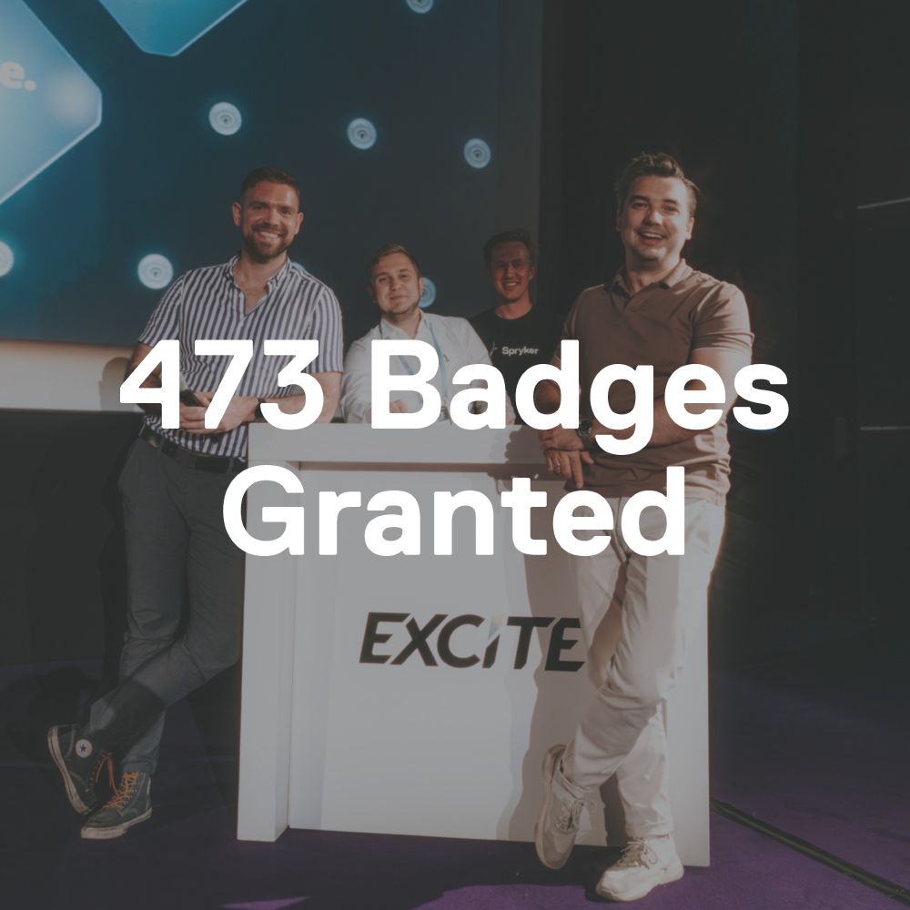 Text "200+ Event Attendees" overlayed on a photo EXCITE where 4 presenters are standing around a desk on stage