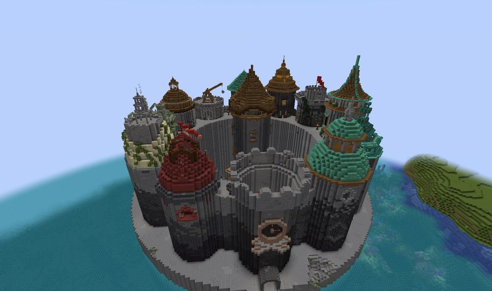 Overhead view of a Minecraft build of a castle type building in the water with 12 different towers. 