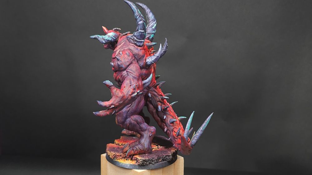 Diablo lord of terror. Red skinned demon miniature on lava base