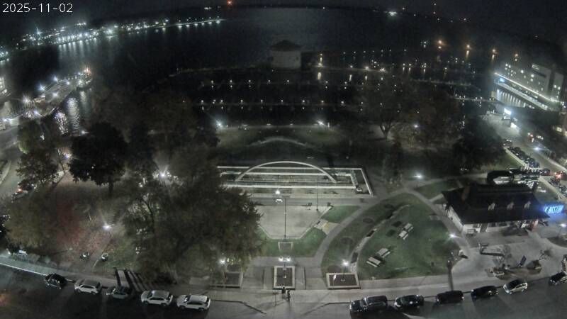 Looking SE from the City Hall clock tower looking out over Ontario Street, Confederation Park and the marina, the Shoal Tower and where the Cataraqui River meets Lake Ontario. // Image captured at: 2025-11-02 23:30:03 UTC (about 1 min. prior to this post) // Current Temp in Kingston: 44.69 F | 7.05 C // Precip: few clouds // Wind: S at 11.498 mph | 18.50 kph // Humidity: 76%