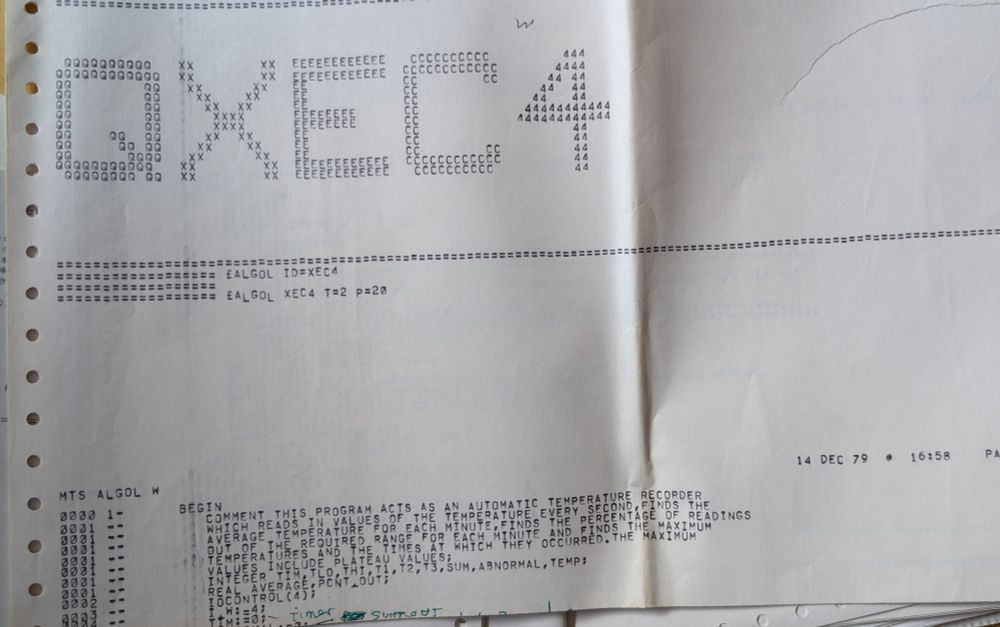 Mainframe computer output printed on live printer fanfold paper.