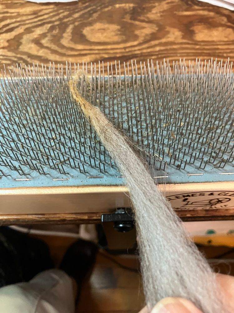 Wool lick with tip on carding cloth block 