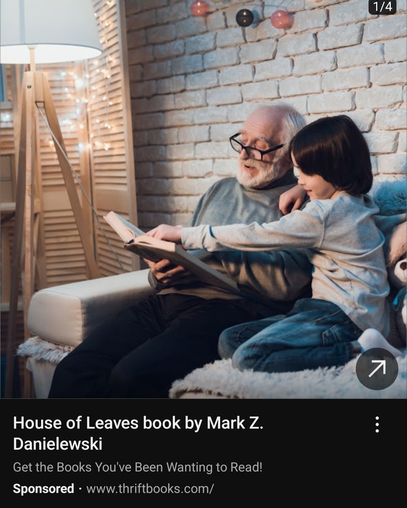 Advertisement for thriftbooks.com featuring an old man and a young boy reading a book together. Under their picture reads House of Leaves book by Mark Z Danielewski