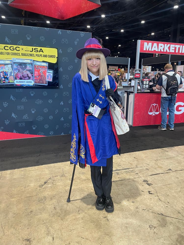 A cosplayer dressed as Rook Hunt from the mobile game Twisted Wonderland 