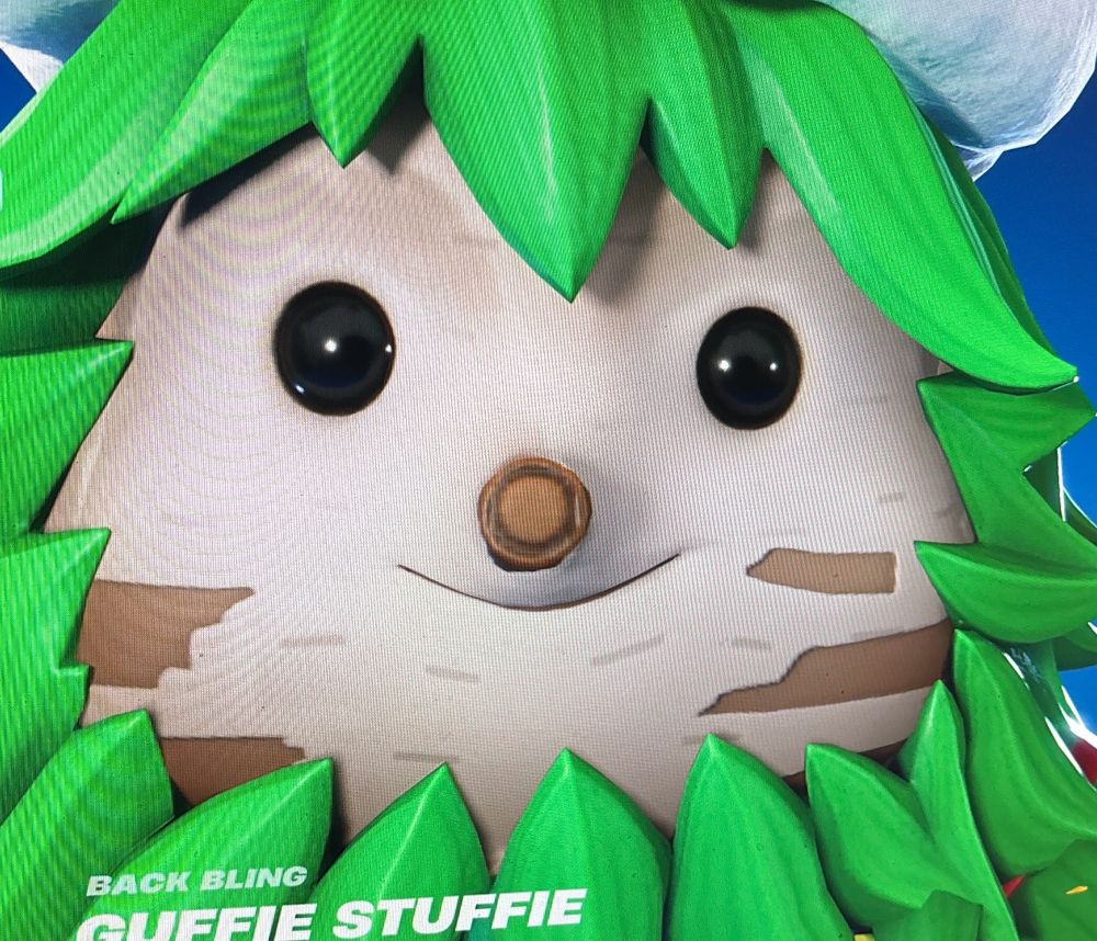 An image of a holiday character zoomed in who looks dead inside but is all festive and cheery on the outside. 