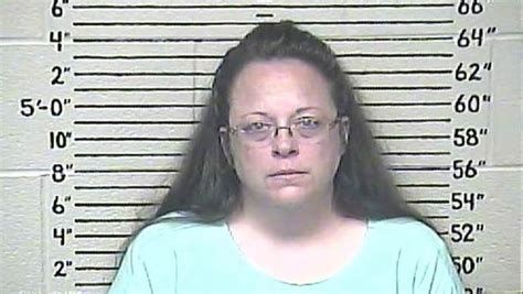 Mug shot photo of KY county clerk Kim Davis, held in contempt for refusing to issue marriage licenses to gay couples after the Supreme Court Obergerfell decision for marriage equality.