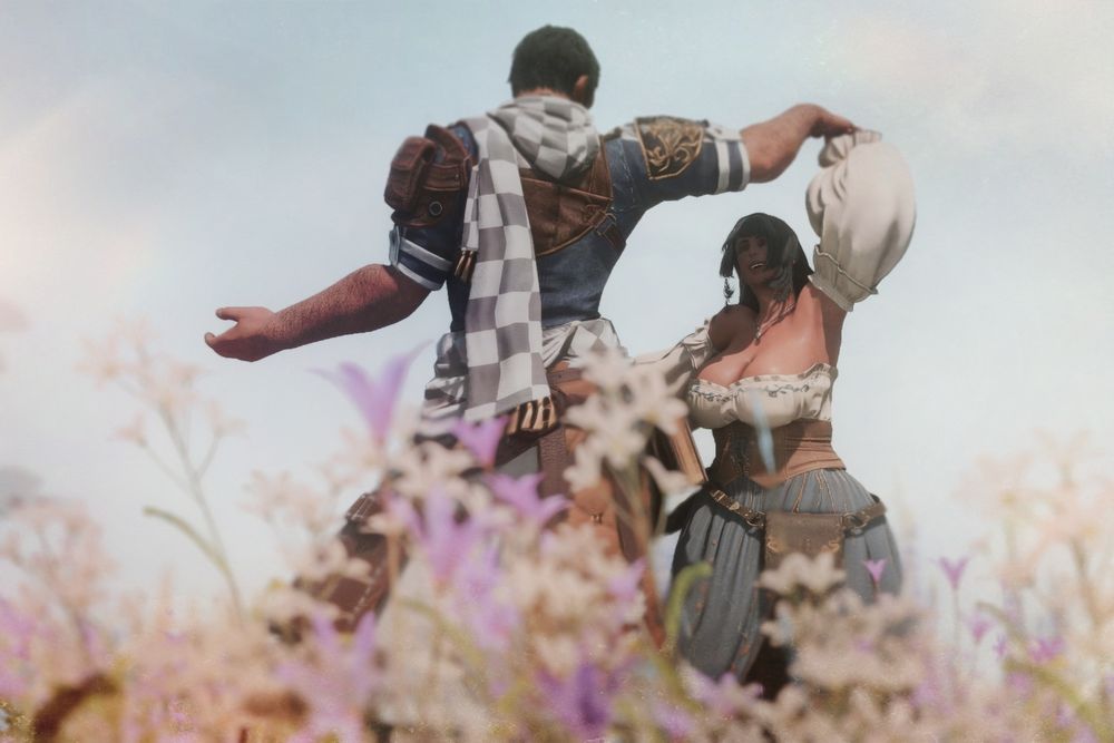 Screenshot of Denys and Dante dancing in a flower field against a hazy blue sky. Denys, whose back is facing the camera, is twirling Dante around while she laughs, her eyes are closed.
