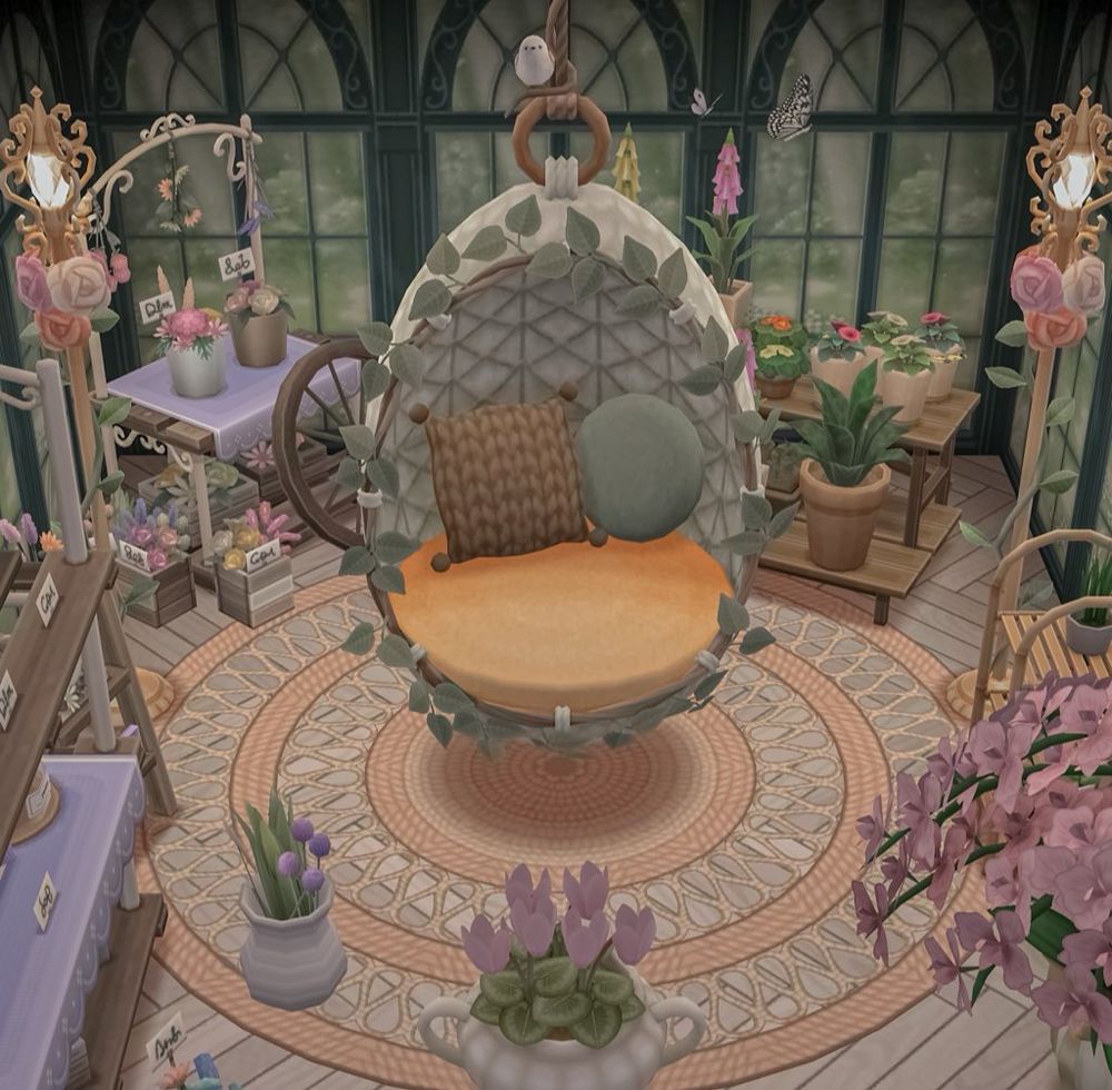  hanging egg chair surrounded by plants designed in animal crossing: pocket camp complete 🪻