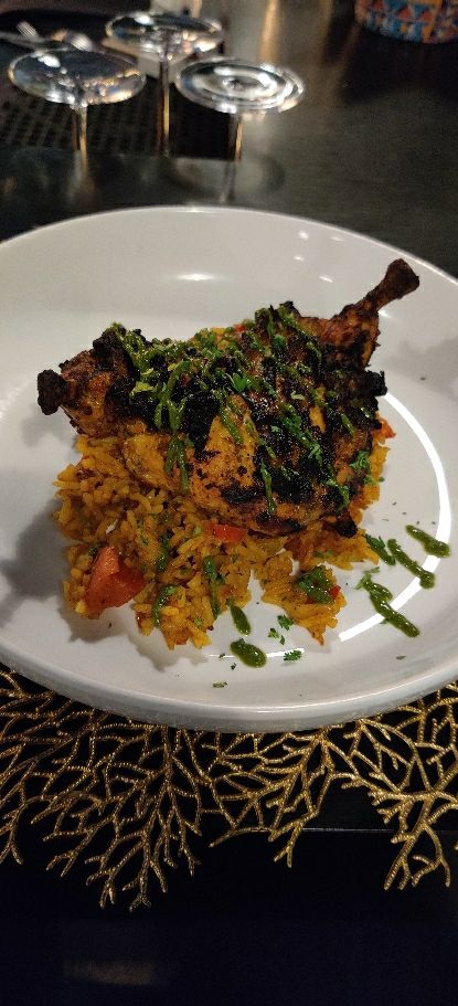 Chicken chooza with jollof rice
