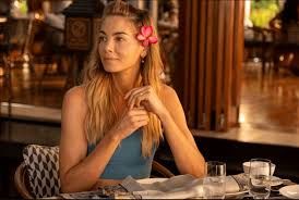 Jaclyn at the dinner table in White Lotus 3