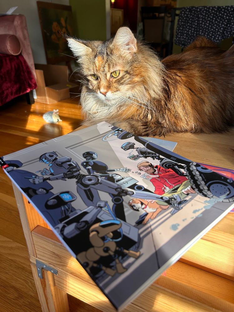 3x3 Illustration Magazine issue #37 sitting on a coffee table in front of a cat.