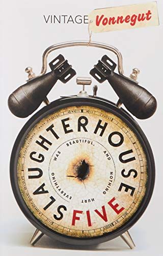 Book Cover Design for SLAUGHTER-HOUSE FIVE by Kurt Vonnegut Jr.: White cover with illustration of old alarm clock--bells at top of clock are shaped like large bombs. Book title runs circularly in side of clock. Author's last name at top left on what looks like a price tag attached to the clock.
