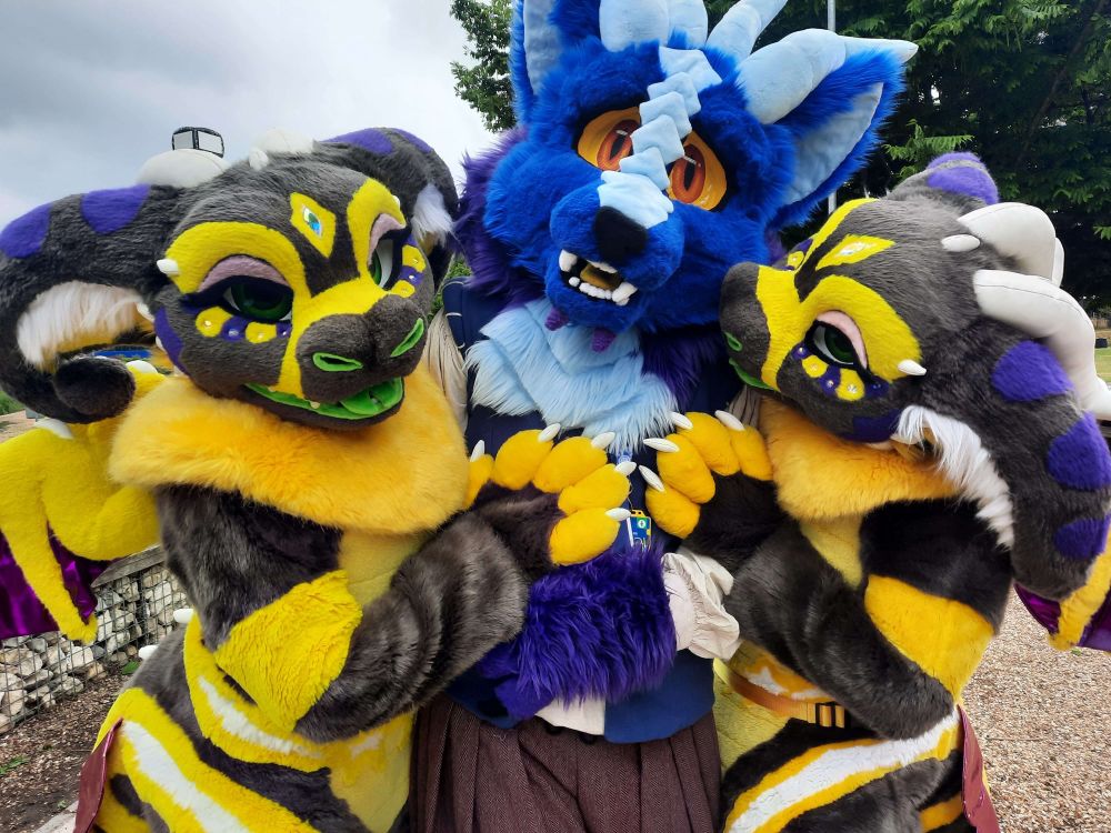 Fursuit selfies at the Dragon meet at ConFuzzled 2025