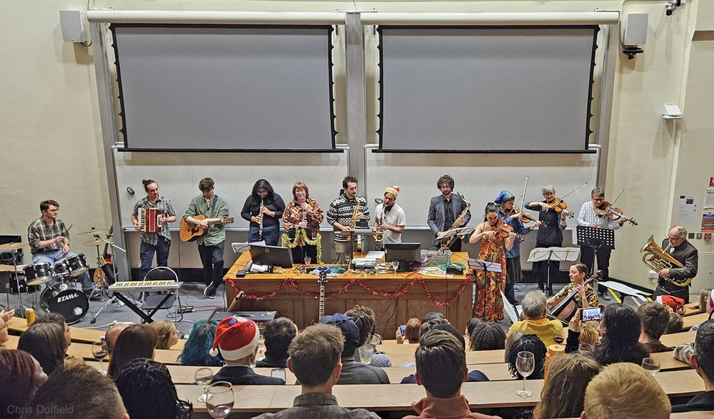 The usual Christmas party shenanigans included Barbara Helm joining the School band (on viola) for Shostakovich's waltz from the movie "The First Echelon"
