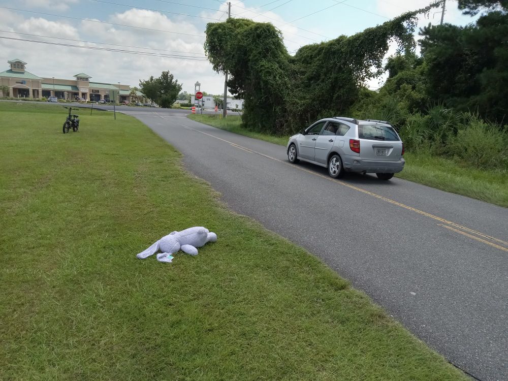 The cars pass unheeding (the bike is mine).