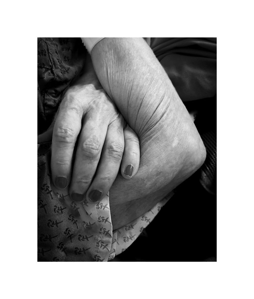 A black and white image of my mams hands. She has dementia and is the reason I’m raising money for Dementia 