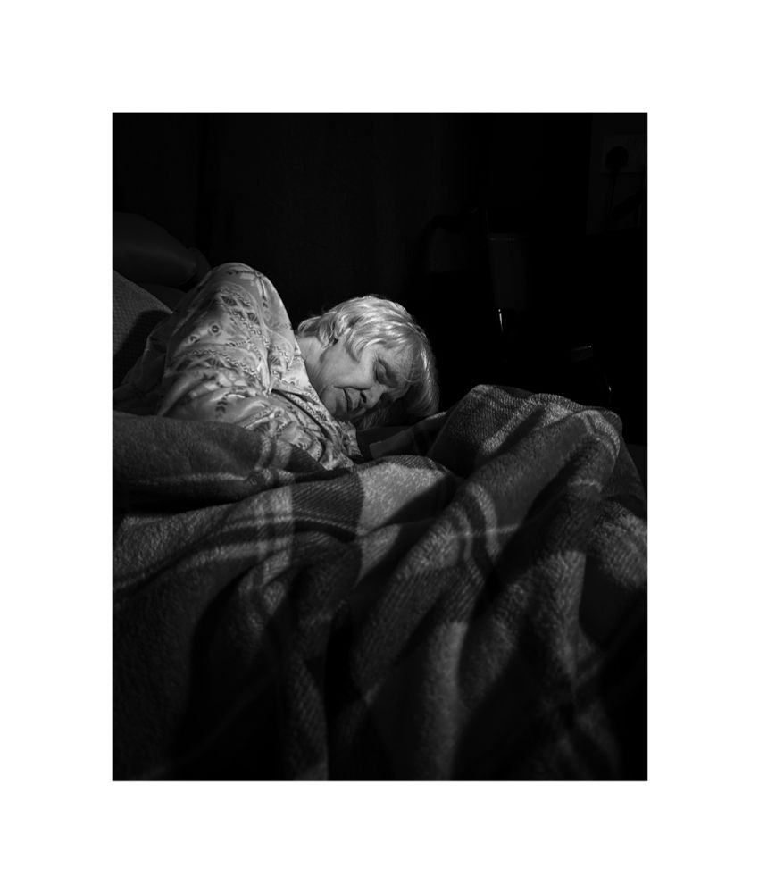 Black and white image of my mam in her care home 