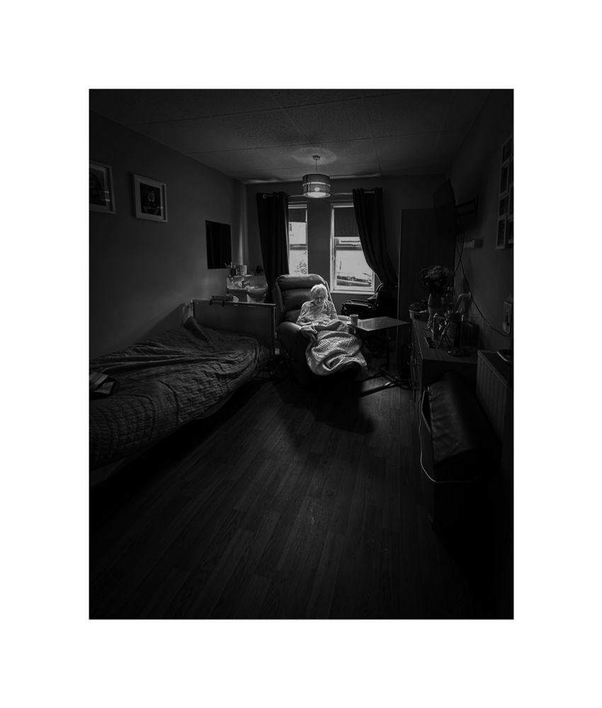 Black and white image of my mam in her care home 