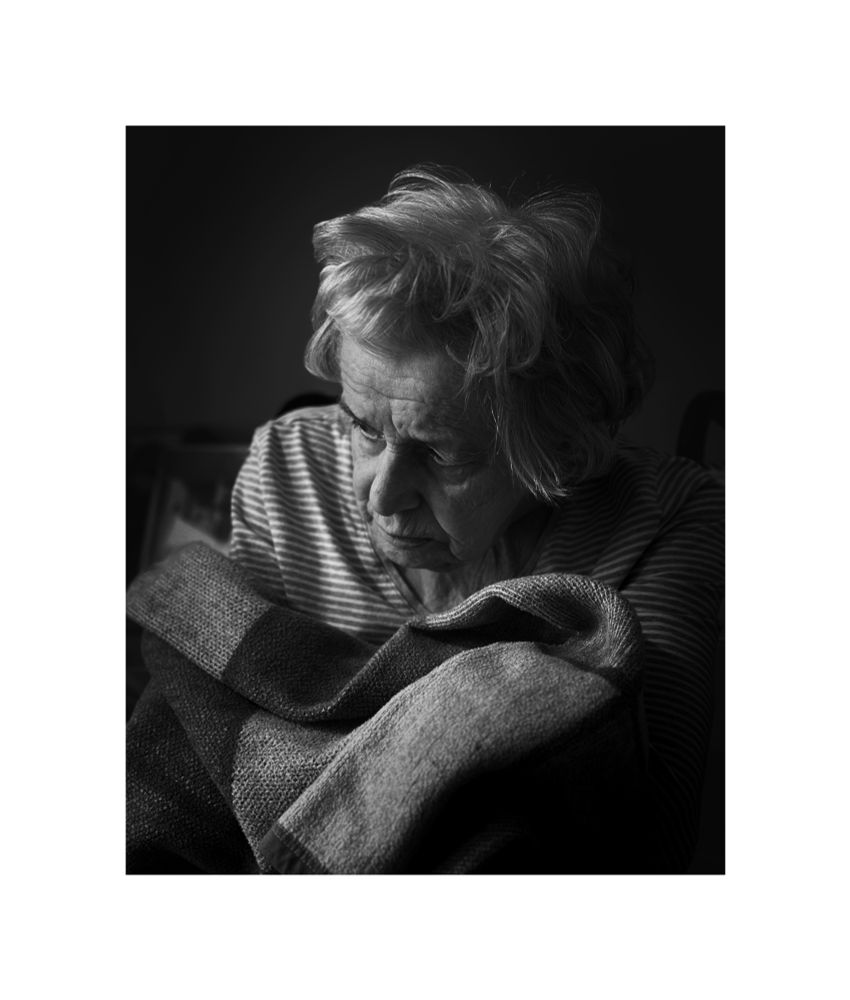 A B&W image of my beautiful mam who has dementia. Wrapped in her favourite blanket 