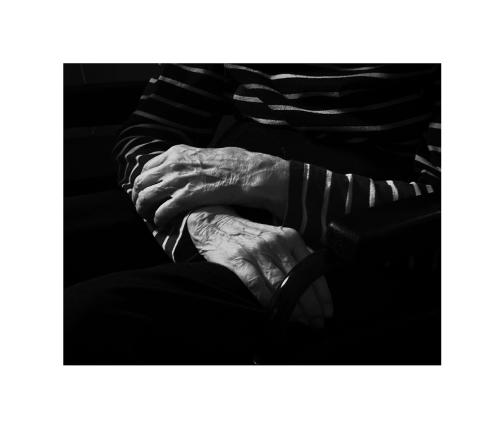 A black and white image of my mams hands. She has dementia and is the reason I’m raising money for Dementia 