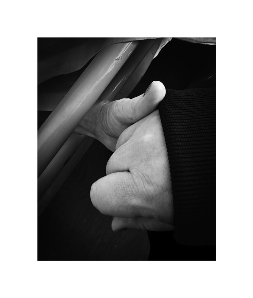 A black and white image of my mams hands. She has dementia and is the reason I’m raising money for Dementia 