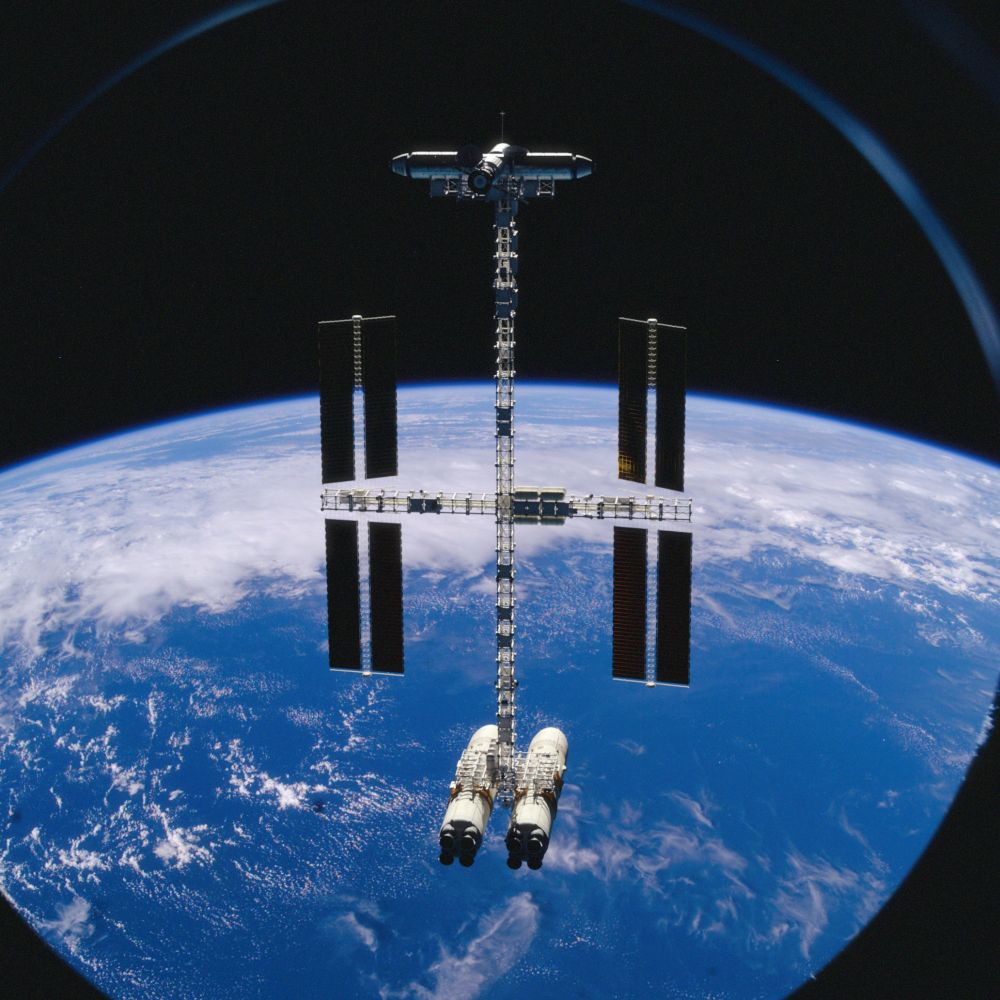 A long and spindly spinning space station with two Energia boosters as a counterweight 