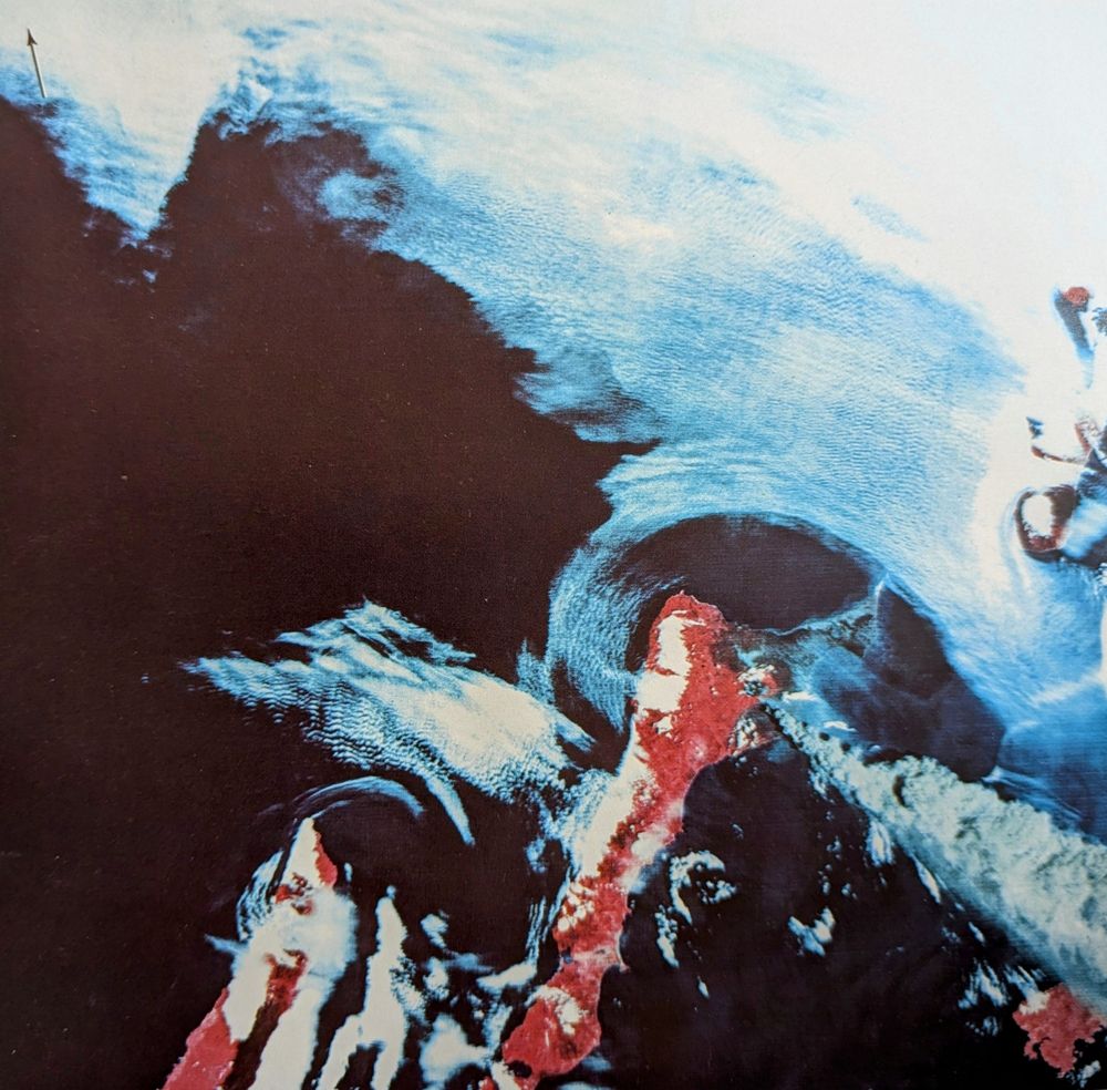 A false color image of an erupting volcano 