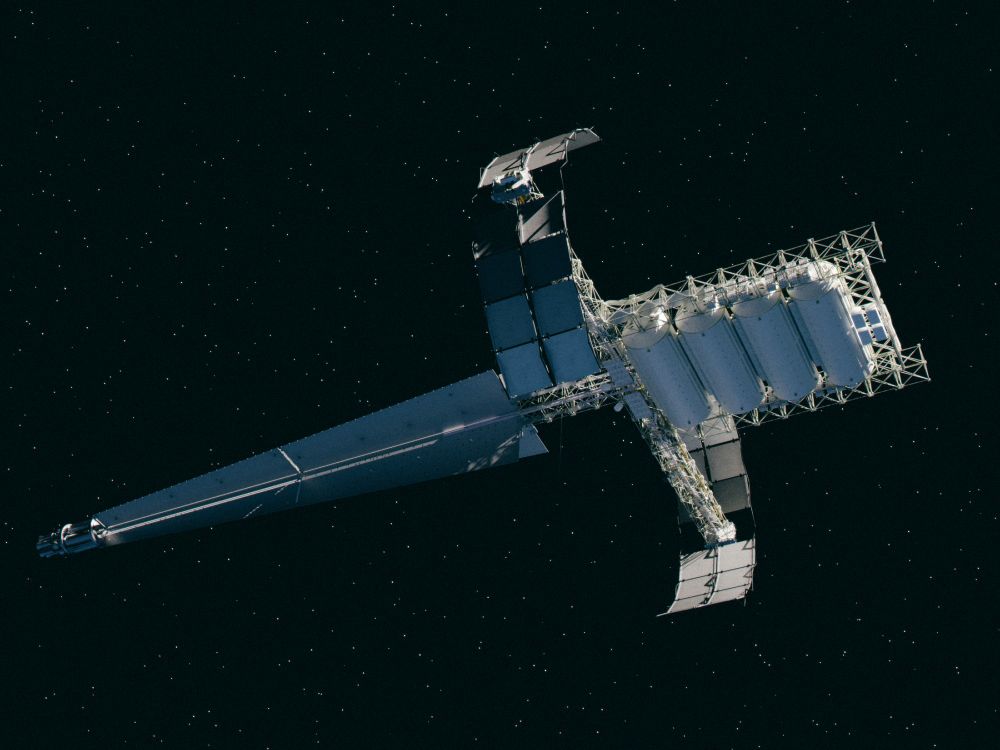 A large tanker ship against a starfield. This is a design for a nuclear powered supply vessel.