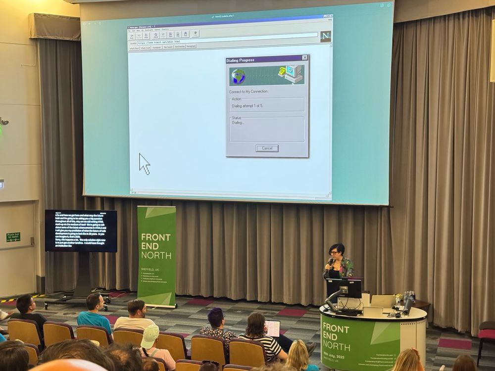 Salma showing a modem dial up screen in her presentation