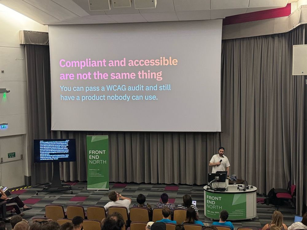Craig presenting a slide that reads "Compliant and accessible are not the same thing. You can pass a WCAG audit and still have a product nobody can use"