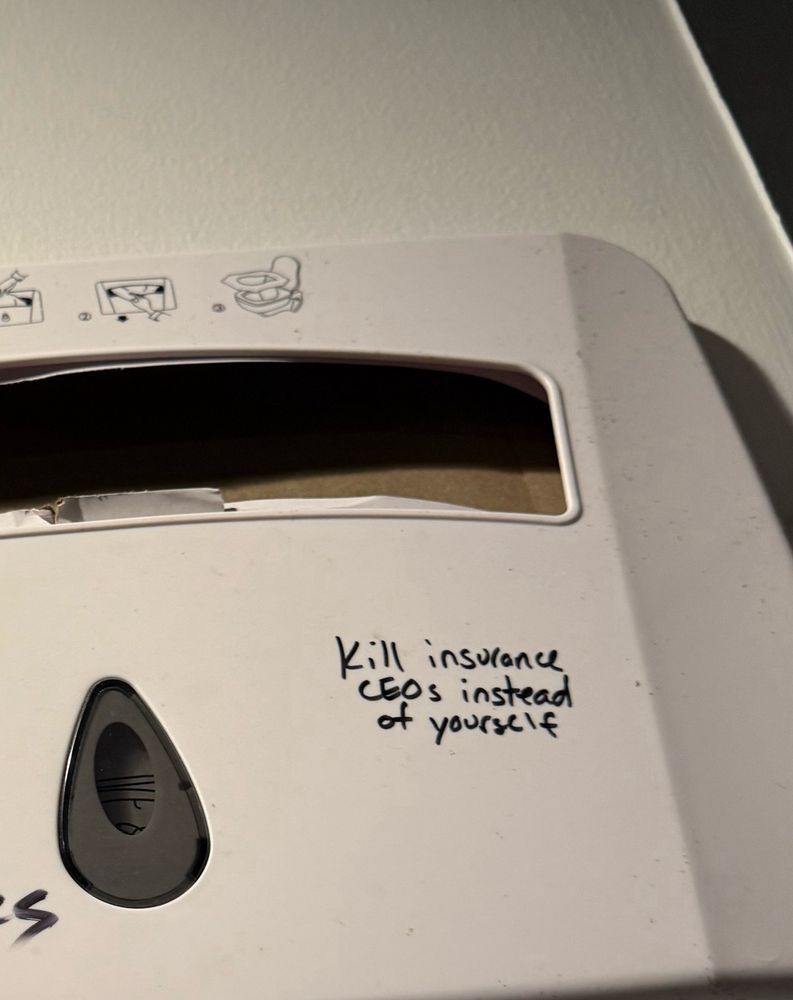 Graffiti in a bathroom stall that says “Kill insurance CEOs instead of yourself” 