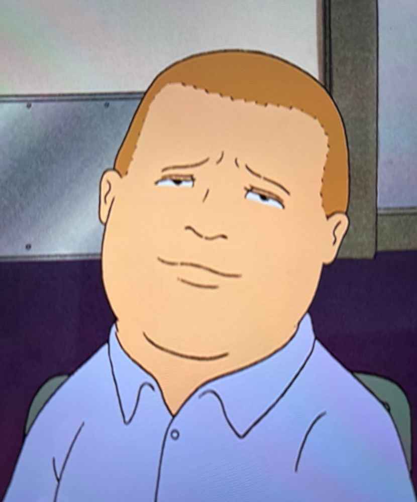 Bobby Hill from ‘King of the Hill’ with a compassionate face that looks kinda like Marlon Brando